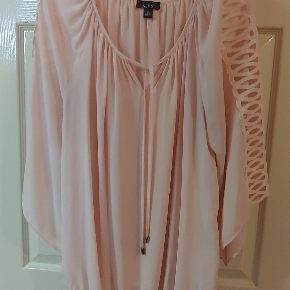 Pink blouse with cutout on arms